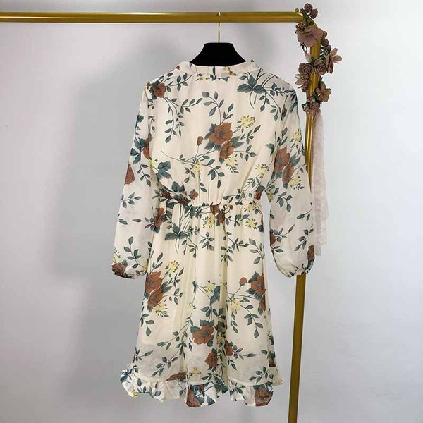 Női rövid sifon ruha hosszú ujjal és nyakkendővel