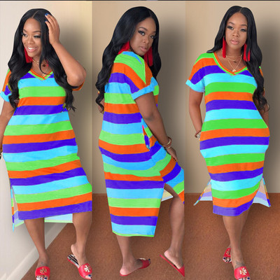 Alkalmi női ruha rövid ujjal és hasítékkal