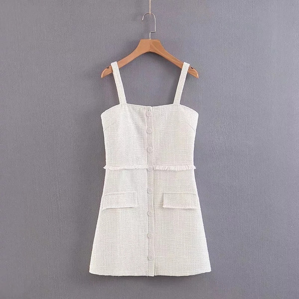 Modern női ruha vékony pántokkal, fehér színben - rövid modell