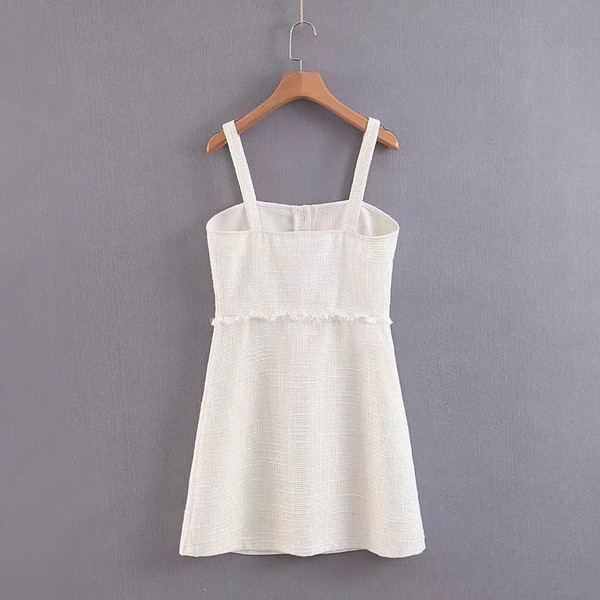 Modern női ruha vékony pántokkal, fehér színben - rövid modell