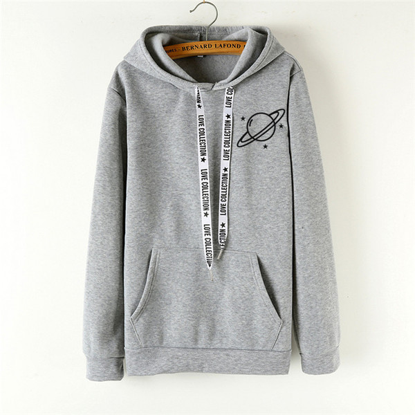 Modern női pulóver rátéttel és nyakkendőkkel több színben