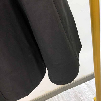 Hosszú női szoknya fekete gombokkal