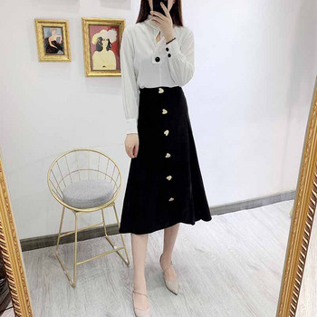 Hosszú női szoknya fekete gombokkal