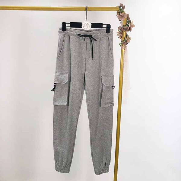 Pantaloni sport de dama cu buzunare laterale