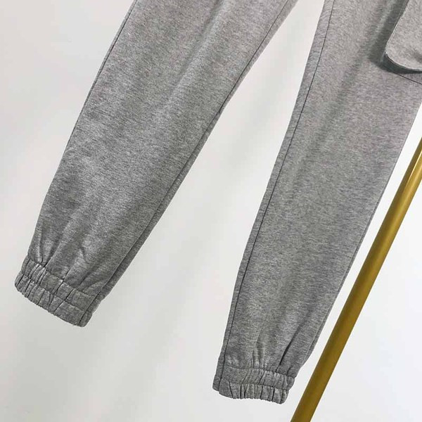 Pantaloni sport de dama cu buzunare laterale