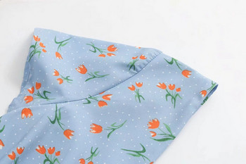 Női ruha mély V-nyakkal, kék színben