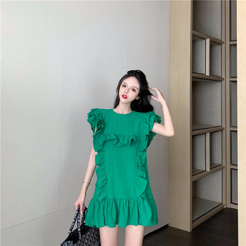 Modern női ruha fehér és zöld színben