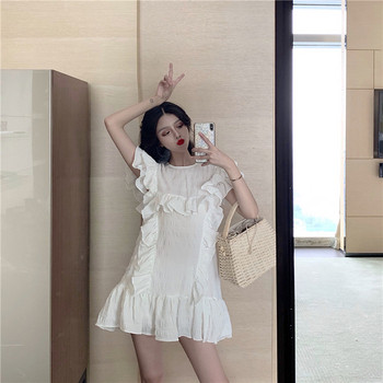 Modern női ruha fehér és zöld színben