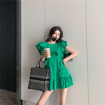 Modern női ruha fehér és zöld színben