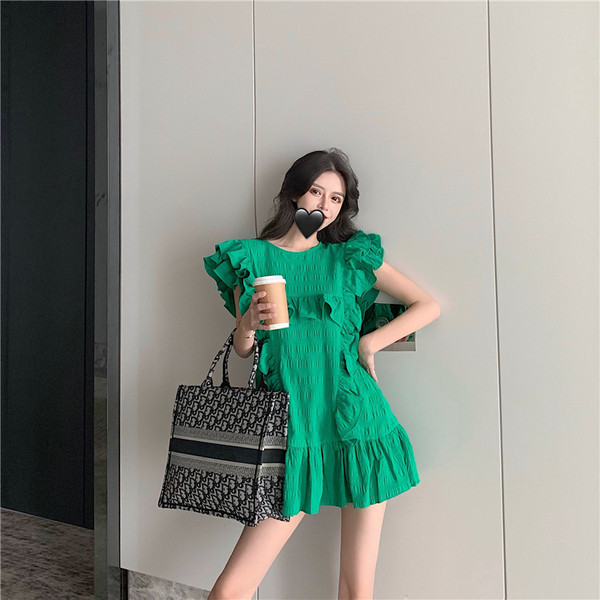 Modern női ruha fehér és zöld színben