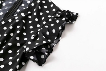 Rochie elegantă de damă cu buline, de culoare neagră