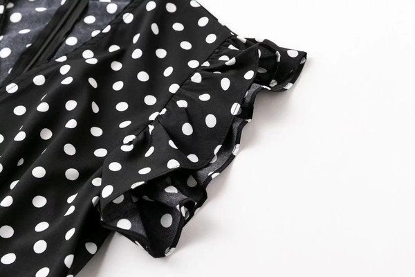 Rochie elegantă de damă cu buline, de culoare neagră