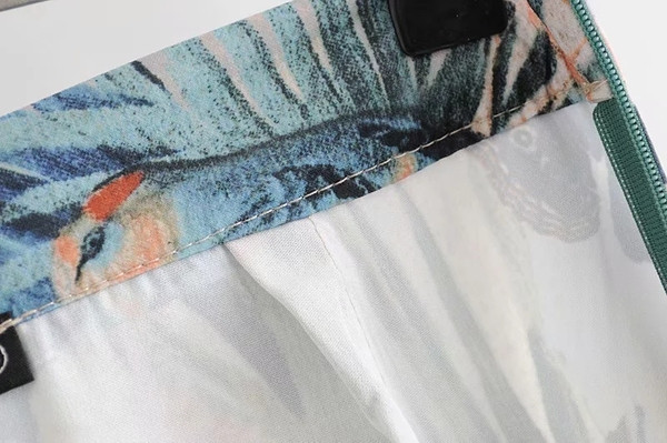 Modern női nadrág rátéttel, magas derékkal