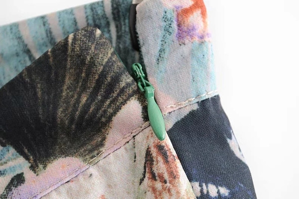 Modern női nadrág rátéttel, magas derékkal