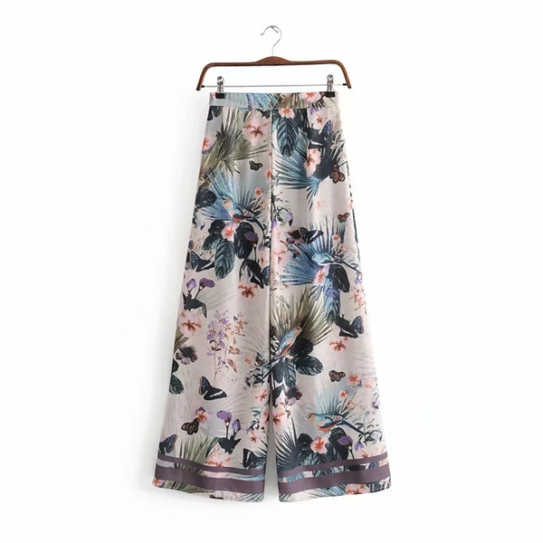 Modern női nadrág rátéttel, magas derékkal