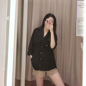 Fekete színű női ing gombokkal és zsebekkel