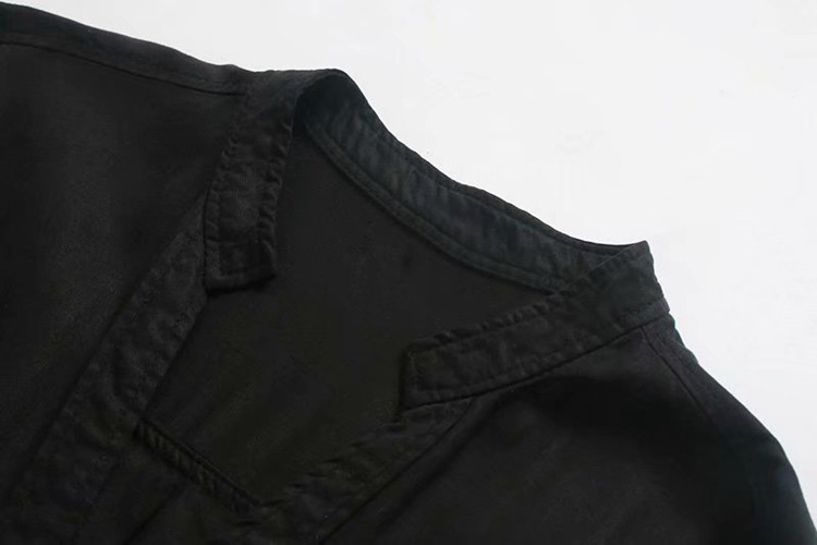 Fekete színű női ing gombokkal és zsebekkel