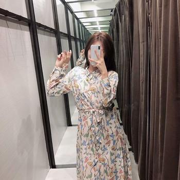 Bézs színű, hosszú alkalmi ruha virágmintával