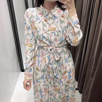 Bézs színű, hosszú alkalmi ruha virágmintával