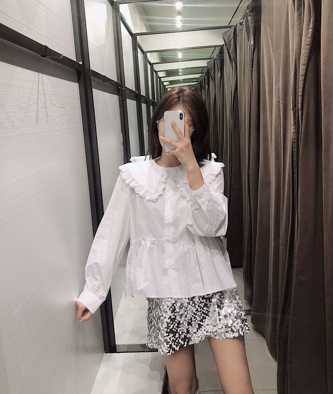 Bluză de damă cu decolteu în V adânc de culoare albă