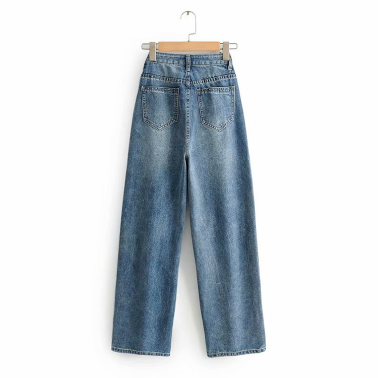 Női farmer kék színben, aszimmetrikus rögzítéssel - széles modell