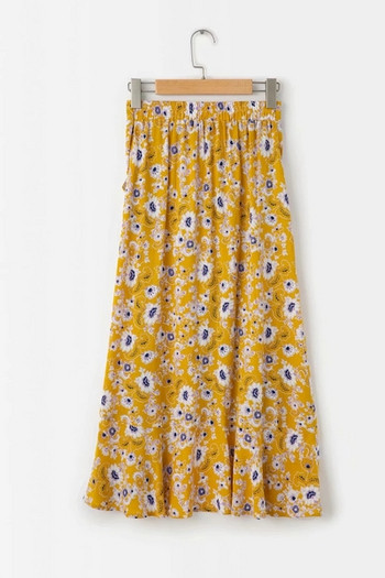 Női szoknya aszimmetrikus modell színes mintával