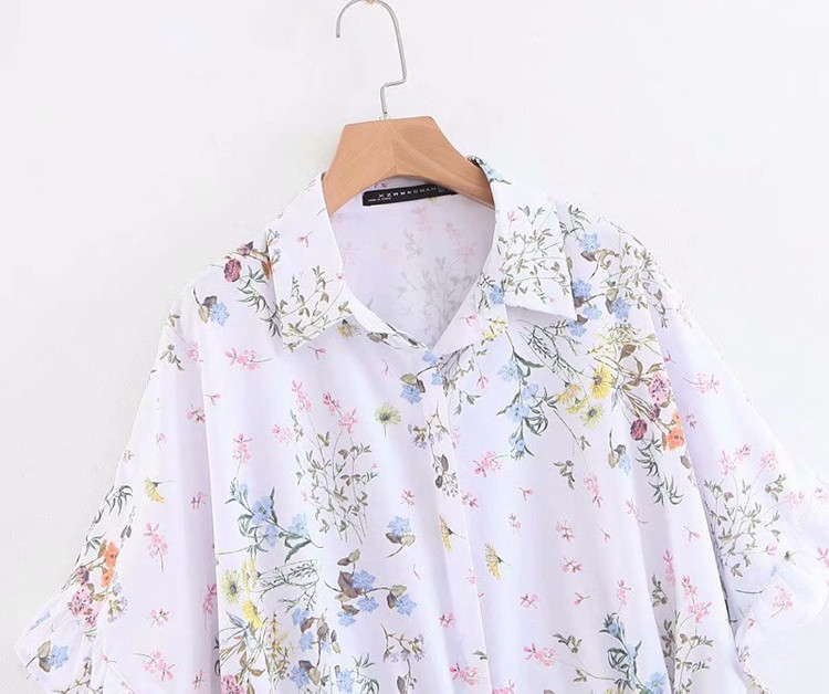 Bluză de damă cu legături în talie în alb cu model