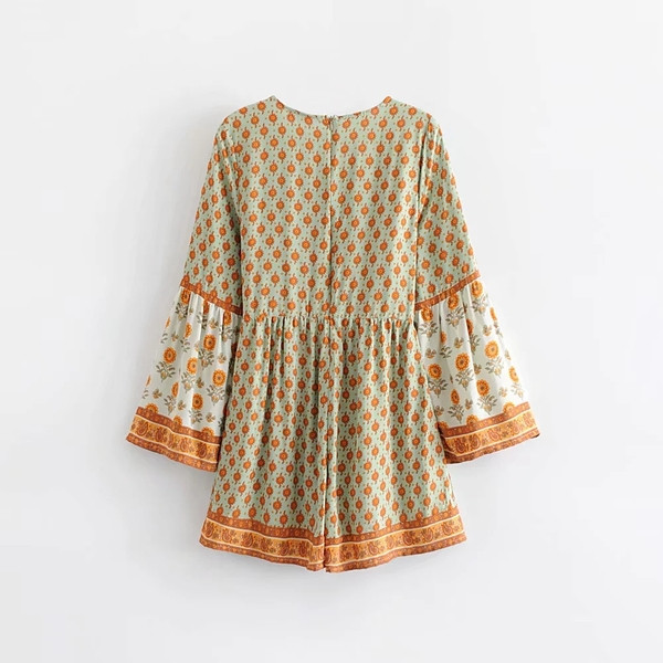 Salopeta de dama cu maneci lungi si cravate