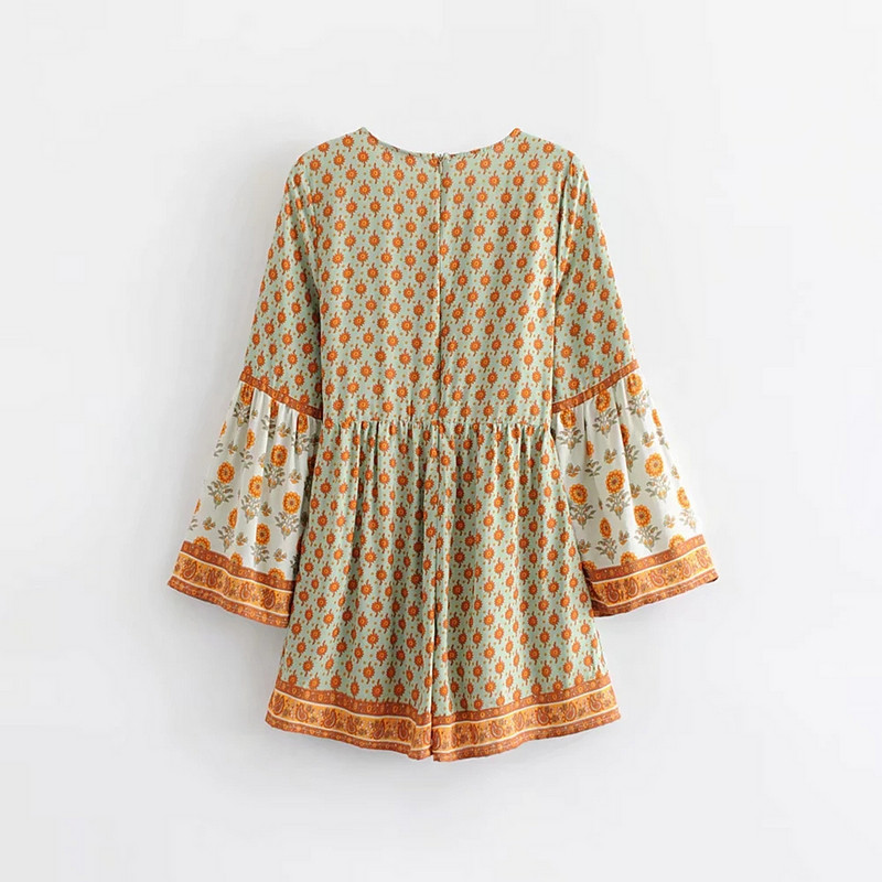 Salopeta de dama cu maneci lungi si cravate