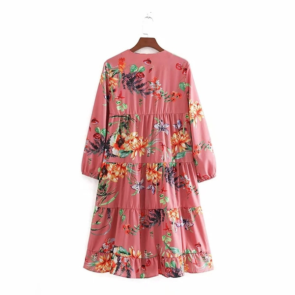 Női ruha hosszú ujjal, színes mintával