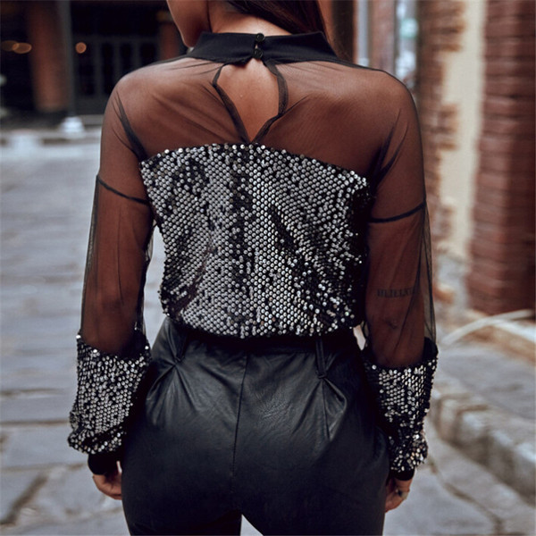 Stílusos női blúz hosszú ujjal és flitterekkel fekete színben