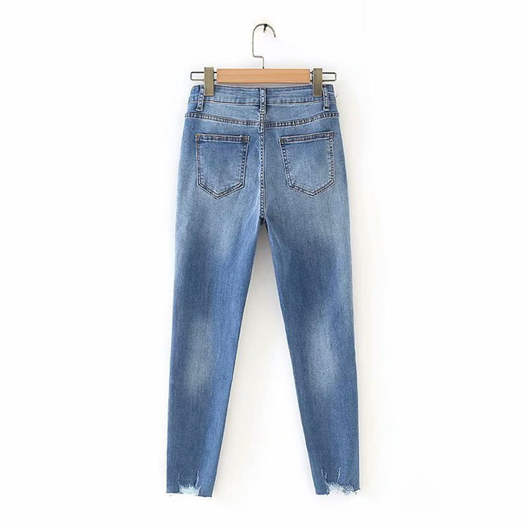 Blugi de dama in albastru cu motive rupte - model slim