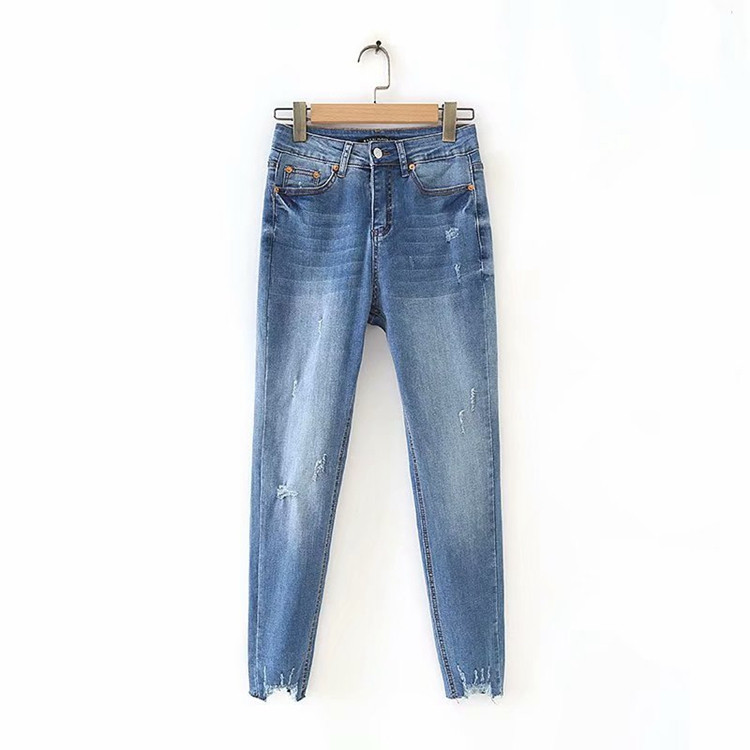 Blugi de dama in albastru cu motive rupte - model slim