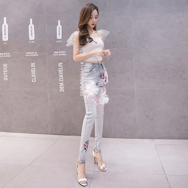 Modern női farmer virágmintás