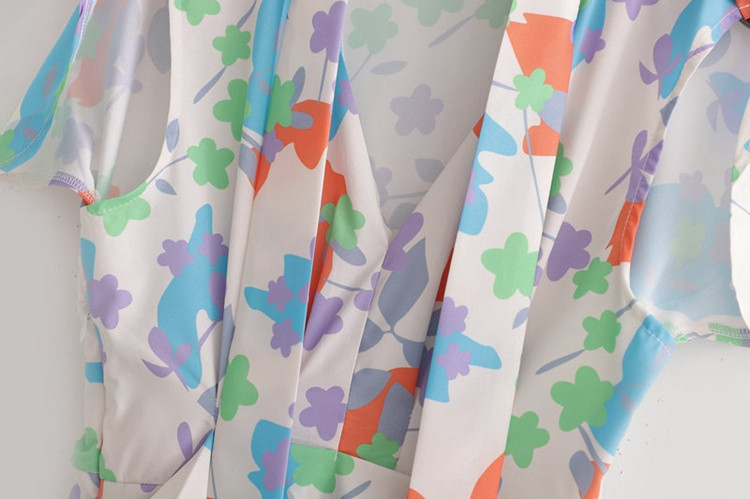 Rochie lunga de dama cu cravate in talie si model floral