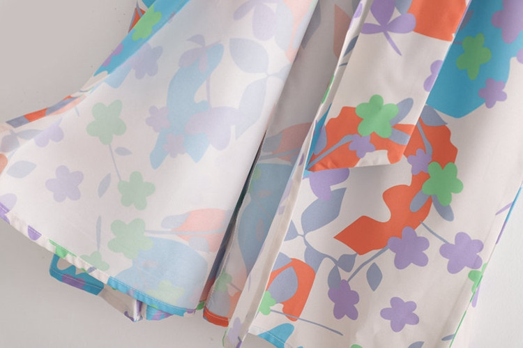 Rochie lunga de dama cu cravate in talie si model floral