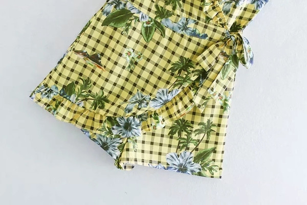 Női nyári overál V-nyakkal