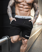 Alkalmi férfi rövidnadrág nyakkendővel, két színben