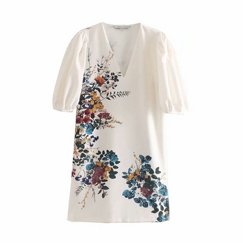 Női ruha V-nyakú és rövid ujjú fehér színben, virágmintával