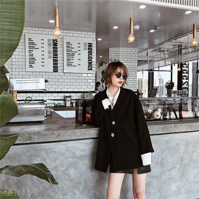 Дамско асиметрично сако в черен цвят 