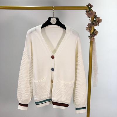 Női kardigán színes gombokkal, több színben