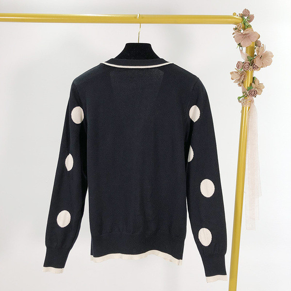 Női alkalmi mellény fekete színben, fehér pöttyökkel