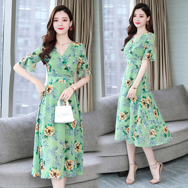 Női alkalmi ruha virágmintás zöld színben