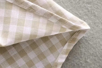 Női ruha övvel a derekán