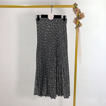 Hosszú redőzött női szoknya fekete-fehér színben