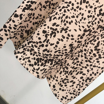 Fusta de dama lunga de culoare roz cu puncte negre