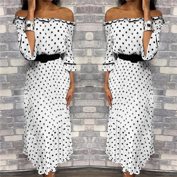 Modern női ruha 3/4 ujjal, fehér színben