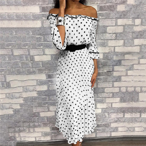 Modern női ruha 3/4 ujjal, fehér színben