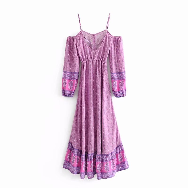 Hosszú szabású ruha pántokkal és hosszú ujjakkal