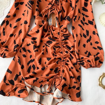 Rochie modernă de damă cu părți decupate și cravate în portocaliu